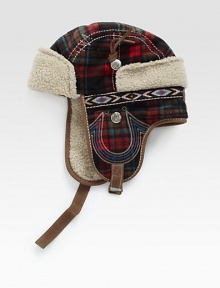 A winter essential, this trapper hat is crafted in a bold check pattern with signature horseshoe detail and trimmed with plush faux fur for long-lasting warmth.50% wool/50% polyesterDry cleanImported A winter essential, this trapper hat is crafted in a bold check pattern with signature horseshoe detail and trimmed with plush faux fur for long-lasting warmth.50% wool/50% polyesterDry cleanImported