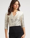 THE LOOKRibbed crew neckline with split detail Zip front Ombré sequin accents ¾ sleevesTHE FITAbout 28 from shoulder to hemTHE MATERIAL35% rayon/29% virgin wool/20% nylon/8% cashmere/8% angora Silk liningCARE & ORIGINDry clean Made in Italy