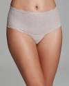 A high waist thong with pretty floral lace overlay and a control top for a sleek silhouette.