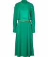 Elegant dress in fine green, synthetic fiber - Narrow blouse top with mini-stand collar, slit neckline and long sleeves and buttoned cuffed - Slightly flared skirt in feminine, trendy mid-length hem - Features decorative gold-colored belt - Pair with boots, platform heels or sandals