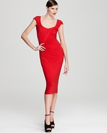 In a chic midi length, this Donna Karan New York dress puts a signature twist on sophisticated style with precisely tailored folds and gathers at the front.