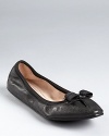 Tiny pleats and grosgrain trim give these bow-topped leather flats an extra hint of girlish charm. From Salvatore Ferragamo.