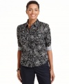 Contrasting striped cuffs pop against the floral print of this petite Karen Scott button-front shirt. Wear yours with a pair of crisp pants for work! (Clearance)