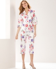 Snuggle up in a pretty springtime print. Morgan Taylor's ruffle top and pants pajama set features quarter-length sleeves and capri pants. Snuggle up in a pretty springtime print. Morgan Taylor's ruffle top and pants pajama set features quarter-length sleeves and capri pants.