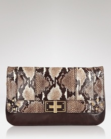 Inspired by retro style, Milly's python-embossed clutch is a classic take on this season's exotic bag trend. But if it has a vintage vibe, this bag's hardware and cool texture keep things wholly current. Inspired by retro style, Milly's python-embossed clutch is a classic take on this season's exotic bag trend. But if it has a vintage vibe, this bag's hardware and cool texture keep things wholly current.