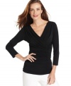 Ellen Tracy's V-neck top is always in style. Pair it with anything in your closet, from sleek trousers to jeans.