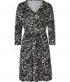 Perfect for taking cool business days to chic city cocktails, DKNYs jersey wrap dress is an eye-catching choice, tailored to four-season sophistication - V-neckline, 3/4 sleeves, gathered waist, self-tie sash, pull-over style - Softly fitted - Wear with bright accessories and edgy leather jackets