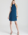 Spunky and spotted, Sweet Pea's printed high neck dress lends playful charm.