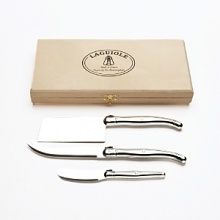 Classic trio of cheese servers includes 4.5 fork-tipped knife, 4 cleaver and 2.75 spreader. Stainless steel handles and blades. Wooden gift box. Classic trio of cheese servers includes 4.5 fork-tipped knife, 4 cleaver and 2.75 spreader. Stainless steel handles and blades. Wooden gift box.