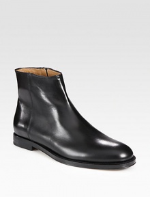 Modern and refined elements merge together to create a sleek '60s-inspired silhouette with an updated rounded toe. Calf leather upperLeather liningPadded insoleLeather soleMade in Italy Modern and refined elements merge together to create a sleek '60s-inspired silhouette with an updated rounded toe. Calf leather upperLeather liningPadded insoleLeather soleMade in Italy