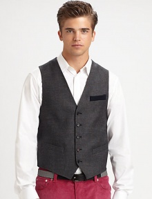 A dapper and distinguished element of any tailored wardrobe is infused with color an character, featuring an argyle-print pattern on the back, rendered in a blend of superior wool and cashmere for a luxurious finish.Button-frontChest, waist welt pockets95% wool/5% cashmereDry cleanMade in Italy