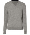 Classically sophisticated, this slim wool pullover from Michael Kors is sure to be a new season staple - V-neck, long sleeves, ribbed hem and cuffs, slim fit - Pair with slim jeans, chinos, or corduroys