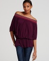 A colorful smocked neckline infuses this Michael Stars peasant top with a bohemian sensibility.