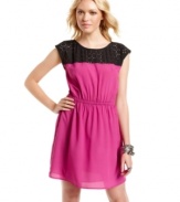 Perforated in laser cutouts and rocking super-stark colorblock style, BeBop's cap sleeve dress is a vivid look for day!