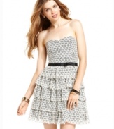 Charm the masses in American Rag's flirty strapless dress! With its lacy design and tiered skirt, this frock is the definition of awesome party style.