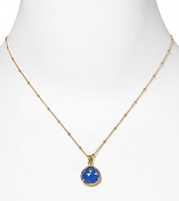 This haute bohemian pendant necklace from Coralia Leets charms with rich texture and hue. The gleaming gold setting sets off a blue chalcedony stone.