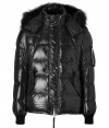 Stay warm while maintaining your luxe style in this sporty, fur trimmed lightweight down jacket from Duvetica - Hooded with raccoon fur trim, long sleeves, ribbed knit cuffs, two-way hidden metal front zip with looped button placket, snapped front pockets, zippered pocket on sleeve, drawstring hemline - Shorter cut, fitted cuffs - Wear with jeans or corduroys and a cashmere pullover