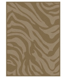 A dramatic zebra print indulges your flair for the exotic, enlivening your space with a chic, contemporary allure. Designed for easy care and long-lasting wear, this striking area rug from Surya will maintain its plush texture even in high-traffic areas.