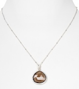 With a faceted smoky quartz pendant, Coralia Leets' 22-karat gold necklace is elegance simplified. Day or after dark, this piece slips on to give a spectrum of looks tonal sparkle.