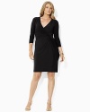 Shirring at one side creates a sleek, flattering silhouette on a dress that's rendered in smooth matte jersey for a look of smart sophistication.