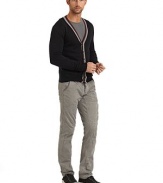 THE LOOKTwo-tone stripes trim the ribbed neckline and front placketButton frontLong sleeves with ribbed cuffsDual front patch pocketsRibbed hemTHE MATERIAL50% wool/50% acrylicCARE & ORIGINHand washImported
