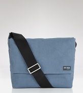 Designed for toting your laptop or tablet around town, this Jack Spade bag features a messenger silhouette in a smaller size, ideal for commutes and local trips.