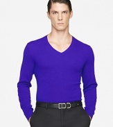 Rendered in soft, sumptuous Italian cashmere, a handsome V-neck sweater exudes modern style in a trim, streamlined silhouette.