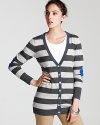 Channel your inner prepster in this C by Bloomingdale's striped cashmere sweater. Contrast elbow patches lend whimsy for playful, everyday style.