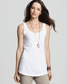Effortlessly layered under draped cardigans and fitted blazers or simply worn on its own, this Eileen Fisher silk tunic is a standout year-round essential. Effortlessly layered under draped cardigans and fitted blazers or simply worn on its own, this Eileen Fisher silk tunic is a standout year-round essential.