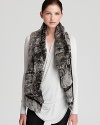 Plush rabbit fur is toughened with leather in this luxe Helmut Lang vest.