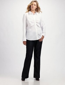 Strategically placed center ruching and a touch of stretch add flattering femininity to this well-tailored shirt. Shirt collar Front button placket with shirred details Three-quarter sleeves with button cuffs Back shoulder yoke Back princess seams Shirttail hem Italian cotton/nylon/lycra Dry clean Imported