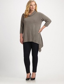 Comfort and style come together in this stylish design. Draped neck Three-quarter length sleeve Pull-on style About 30 from shoulder to hem 95% viscose/5% spandex Hand wash Imported 