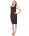 T Tahari's petite dress takes the look of two pieces and puts them together in one fantastic-fitting style. A slight ruffle at the neckline and a skinny band at the waist add interest to this sheath silhouette. (Clearance)