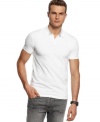 White out. Hit the Hamptons with surefire style wearing this Calvin Klein CK One polo shirt.