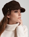 Add edge to your look with this plush shearling cap from UGG® Australia.