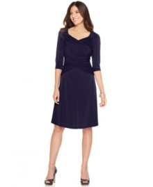 This B-Slim dress from Elementz lends a flattering fit, thanks to a clever slimming tummy panel. Pair it with pumps for a no-fuss look on your next night out!