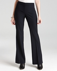 Bring timeless chic to the workday in these Elie Tahari stretch wool straight-leg pants.