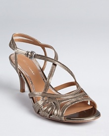 Equipped with a modest two-and-a-half-inch heel, Elie Tahari's metallic Alexandra sandals make dancing all night a stylish (and comfortable) affair.