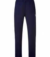 Inject sporty style into your casual look with these fleece pants from Polo Ralph Lauren - Elasticized waistband, side stripe at legs, logo detail at hip - Style with a tee, matching pants, and retro-inspired trainers