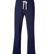 Sporty separates are casual wardrobe essentials, and these Polo Ralph Lauren navy cotton fleece pants have enduring appeal - Classic, straight leg cut - Hidden drawstring tie waist and slash pockets at sides - Embroidered polo pony logo at thigh - Easy and indispensable, perfect for pairing with t-shirts, pullovers and coordinating hoodies