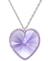 Express your affection for someone special with this sweet, romantic design. Swarovkski's reverie pendant features a perfectly-faceted violet crystal pendant wrapped in a delicate Pointiage edging. Crafted in silver tone mixed metal. Approximate length: 15 inches. Approximate drop: 3/4 inch.