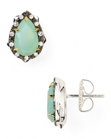 The garden serves as inspiration for this pair of thorn-shaped studs from Elizabeth and James, accented by striking aqua chalcedony and sapphire stones.