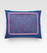 An brilliant accent for the top of the bed or end of the sofa, woven with vivid paisleys in yarn-dyed jacquard. Double ribbon trim Zip closure 12 X 16 Polyester/cotton with polyfill insert Imported