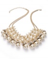 Grace your neckline with modern elegance. This bib necklace from Charter Club strings acrylic pearls with gold tone spacers and glass accents. Crafted in gold tone mixed metal. Approximate length: 39-1/2 inches + 3-inch extender. Approximate drop: 3 inches.