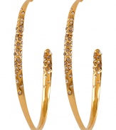 Add a stylish accent to any look with these crystal-embellished hoop earrings from modern jewelry master Alexis Bittar - Gold-tone hoops with crystal embellishment - Pair with a figure-hugging cocktail frock and heels or a boho-chic off-duty ensemble