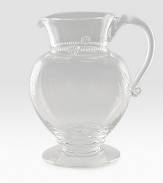 A simply stunning glass pitcher marries a traditional silhouette with a spiraled sphere ground. Extraordinary thread and berry detail creates all the interest and charm of an heirloom classic. 76 oz. capacity 9½H X 7½ diam. Dishwasher safe Imported 