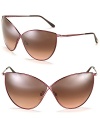 New from Tom Ford! Sleek criss-cross sunglasses in a modern cat eye silhouette.