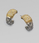 An exotic, sterling silver design with dazzling diamonds and radiant 18k gold accents. Sterling silver18k goldDiamonds, .58 tcwLength, about 1Post backImported 