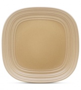 With the look of hand-thrown pottery in hard-wearing stoneware, the square Swirl salad plate from Mikasa enhances casual meals with fuss-free elegance. A matte finish with glazed accents adds stylish distinction to a serene tan hue.