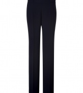 Luxe trousers made of fine, dark blue synthetic fiber - Modern silhouette with wide flared leg - Leg-lengthening, flattering pleats - Side concealed zipper closure - Classic style for the office, leisure or evening - Style with blouses, cardigans and heels for endless wardrobe options